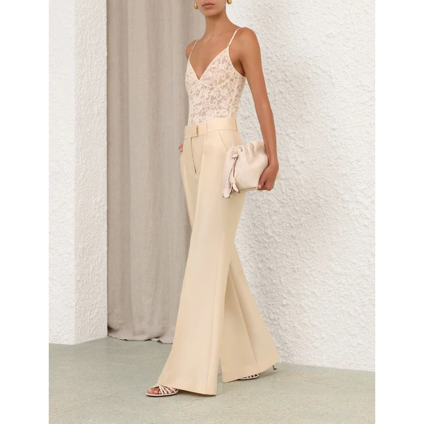 Elevate your elegance in this Zimmermann Bodysuit available now at Luxury Shoes 