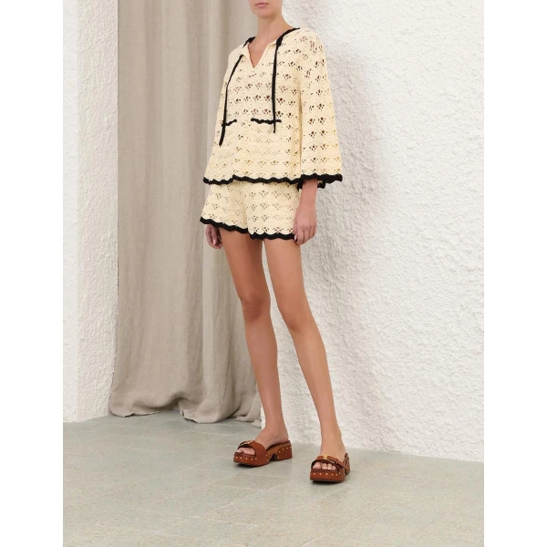 Elevate your elegance in this Zimmermann Tops available now at Luxury Shoes 