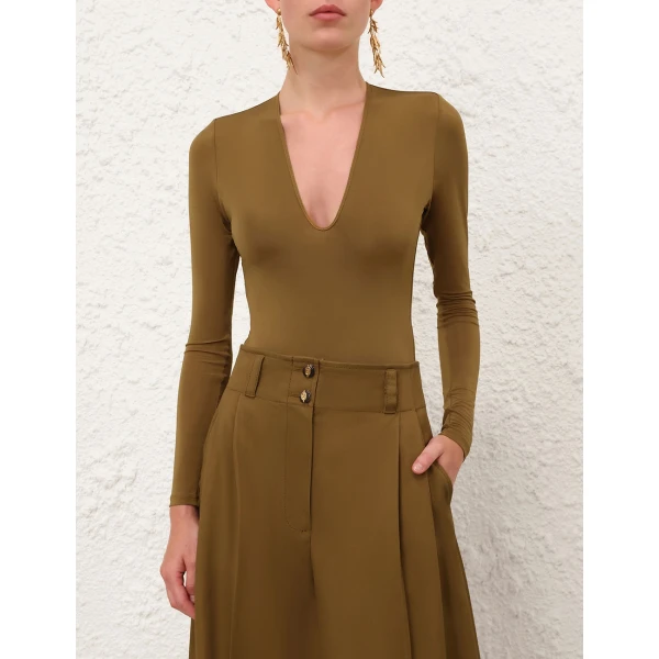 Elevate your elegance in this Zimmermann Bodysuit available now at Luxury Shoes 