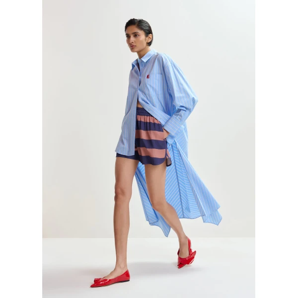 Essentiel Antwerp Light Blue And White Oversized Cotton Shirt With Transformable Tie Detail - Essentiel Antwerp Tops - Colorful Belgian Design - Shop at Luxury Shoes 