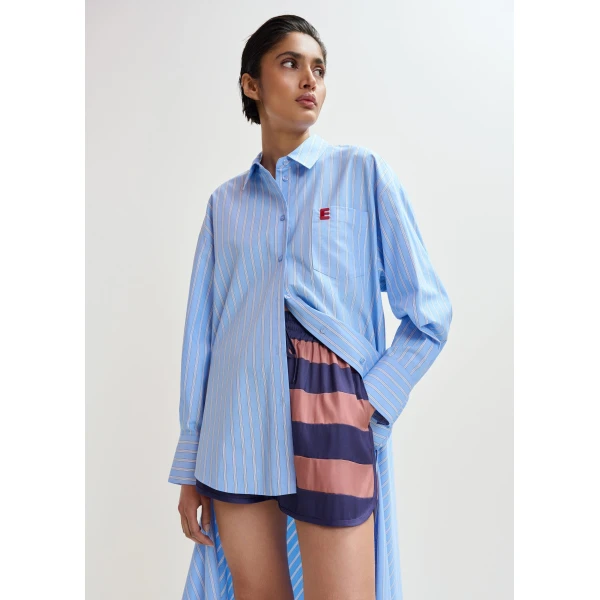 Essentiel Antwerp Light Blue And White Oversized Cotton Shirt With Transformable Tie Detail - Essentiel Antwerp Tops - Colorful Belgian Design - Shop at Luxury Shoes 