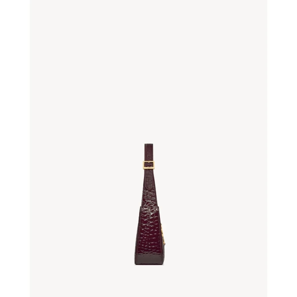Saint Laurent LE 5 À 7 in crocodile-embossed patent leather designed in Paris