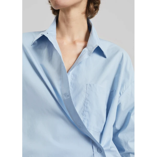 The Frankie Shop Ornella Side Button-Up Shirt - Light Blue - Oversized Minimalist Tops in Blue - Shop at Luxury Shoes 