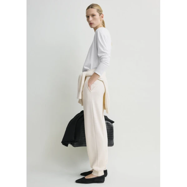 Totême Pintucked Sweatpants Ecru - Pants - Scandinavian Minimalist Luxury at Luxury Shoes 