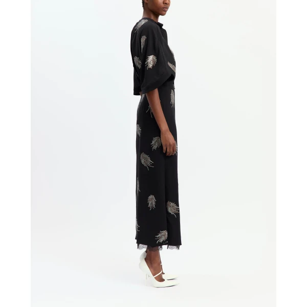 Elevate your elegance in this 16 Arlington Dresses from the luxury feather dress edit