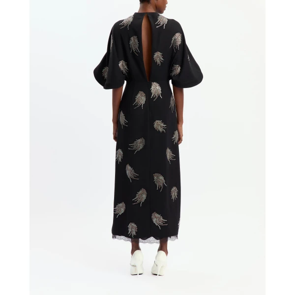 Elevate your elegance in this 16 Arlington Dresses from the luxury feather dress edit