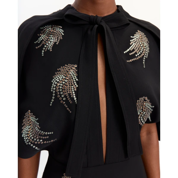 Elevate your elegance in this 16 Arlington Dresses from the luxury feather dress edit