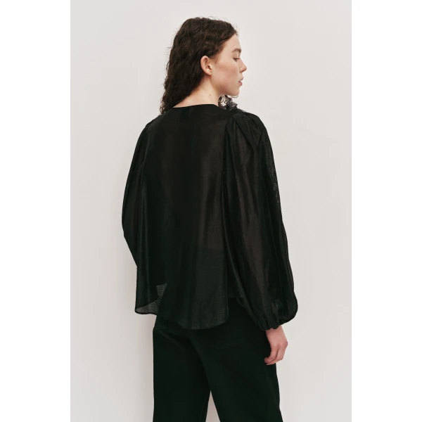 Aje Aus  – structured silhouette with raw femininity from Luxury Shoes 