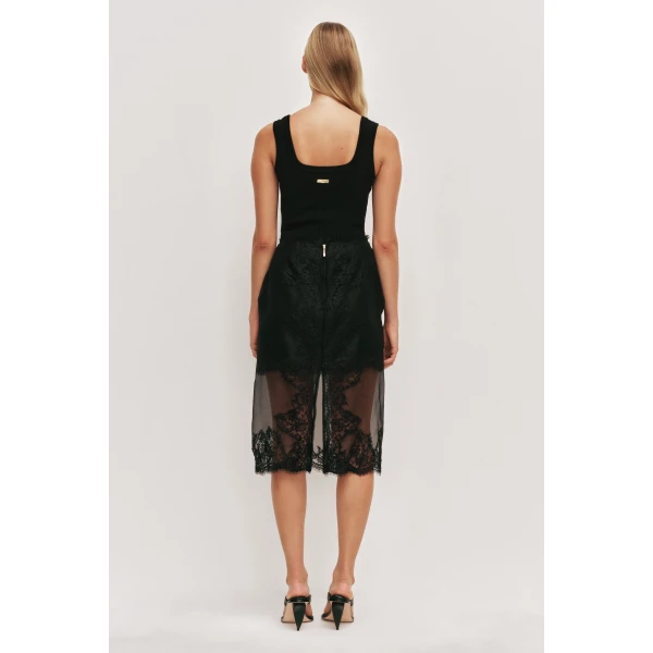 Aje clothing Aus  – structured silhouette with raw femininity from Luxury Shoes 