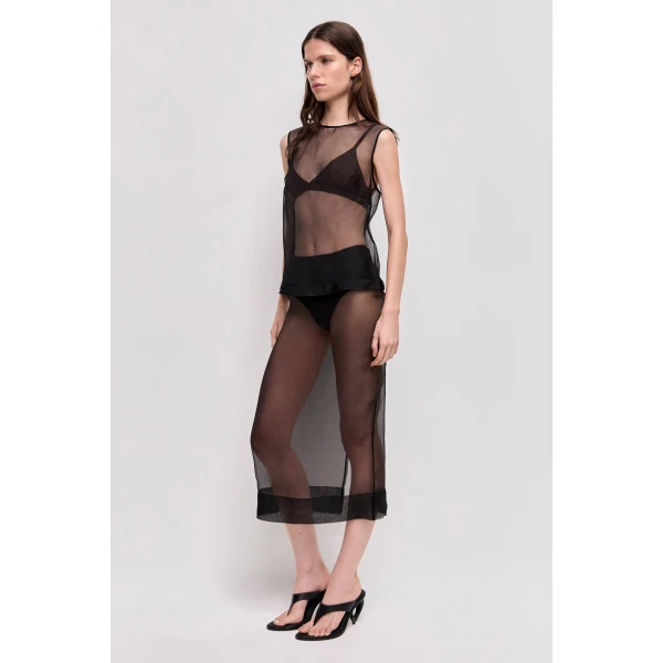 Aje Aus  – structured silhouette with raw femininity from Luxury Shoes 
