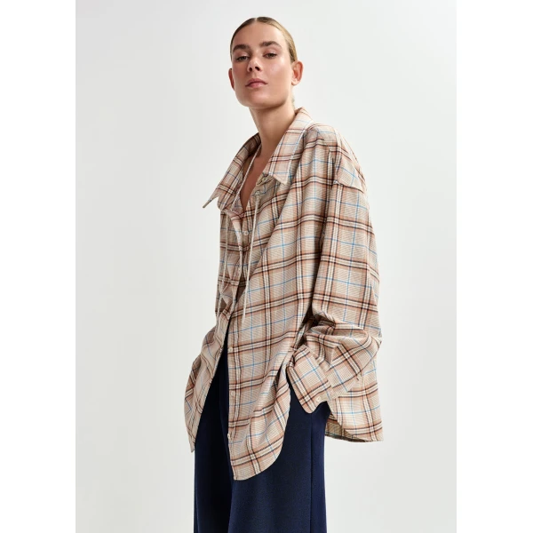 orange and blue oversized plaid shirt with rhinestone chain