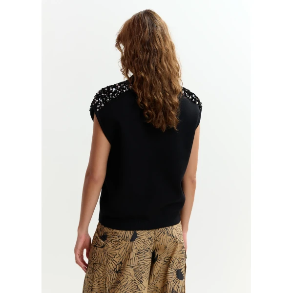 Belgian designer tops