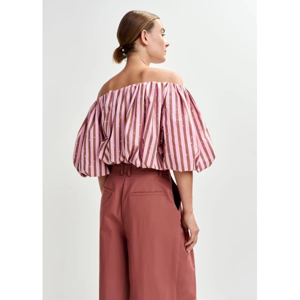 Belgian designer tops