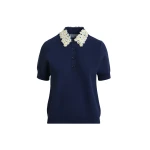 Dark blue fine knit polo top with white and yellow floral embellished collar