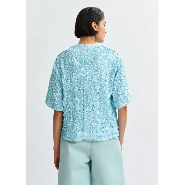 Belgian designer tops