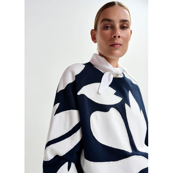 Belgian designer tops