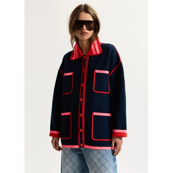 red and pink fine knit cardigan with lace-trimmed collar and strawberry-shaped buttons