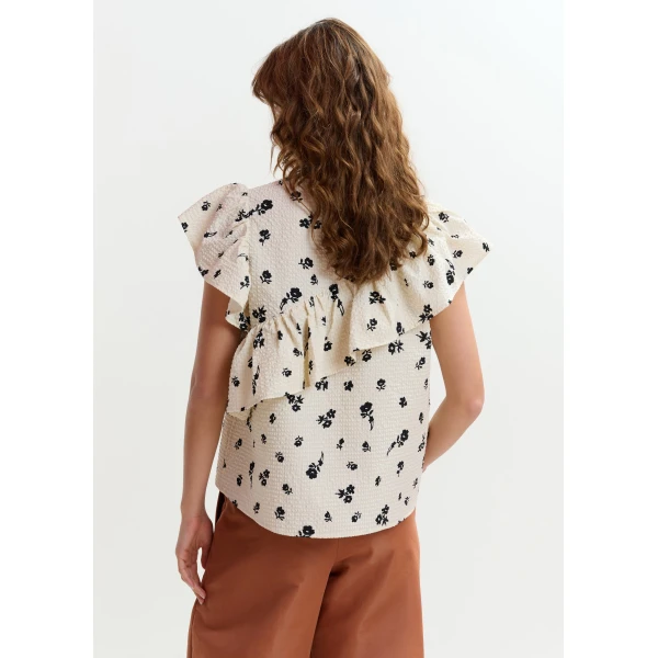 Belgian designer tops