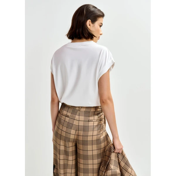 Belgian designer tops