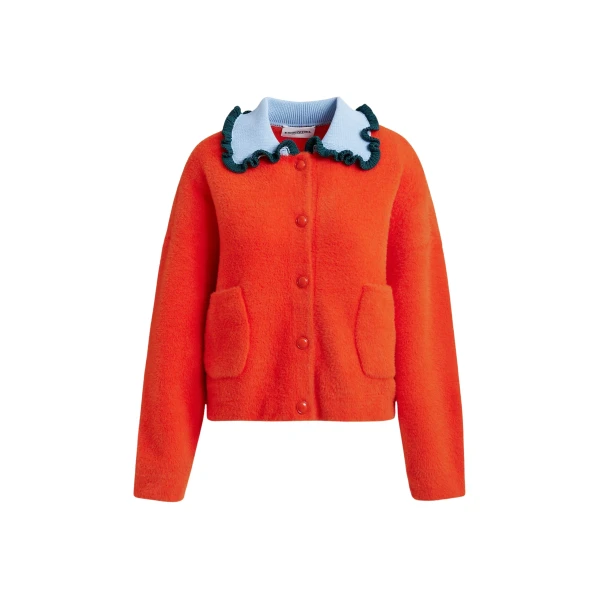 Orange cardigan with contrasting light blue and dark green ruffle collar