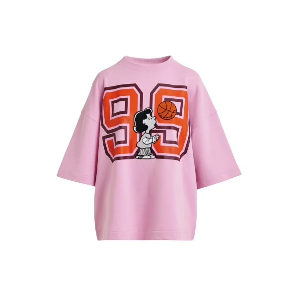 Pink T-shirt with appliquéd Peanuts™ Lucy patch and text print