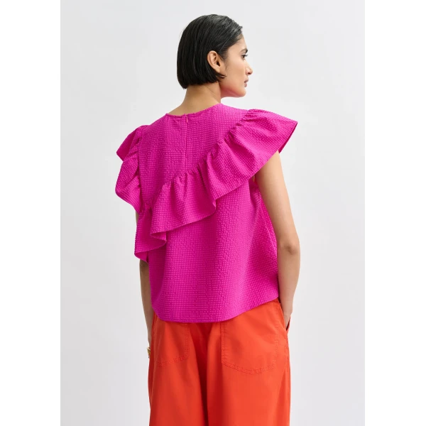 Belgian designer tops