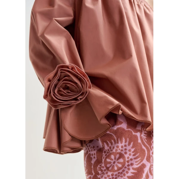 Belgian designer tops