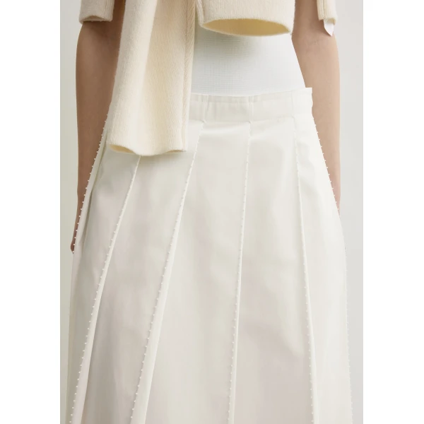 Totême Beaded pleat skirt in White - Skirts - Scandinavian Minimalist Luxury at Luxury Shoes 