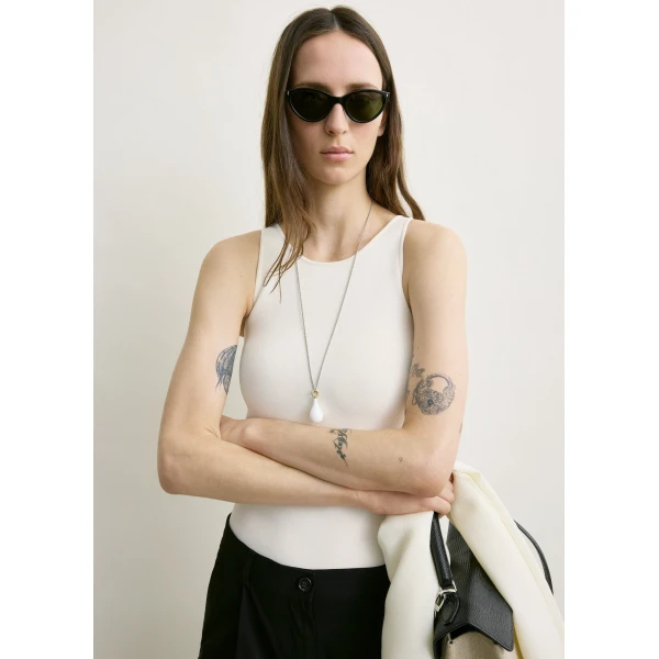 Totême Classic compact knit tank in White - Knitwear - Scandinavian Minimalist Luxury at Luxury Shoes 