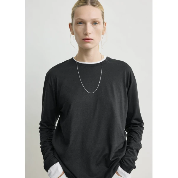Totême Classic long-sleeve tee in Black - Tops - Scandinavian Minimalist Luxury at Luxury Shoes 