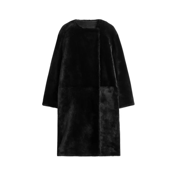 Totême Collarless shearling coat in Black - Coats - Scandinavian Minimalist Luxury at Luxury Shoes 