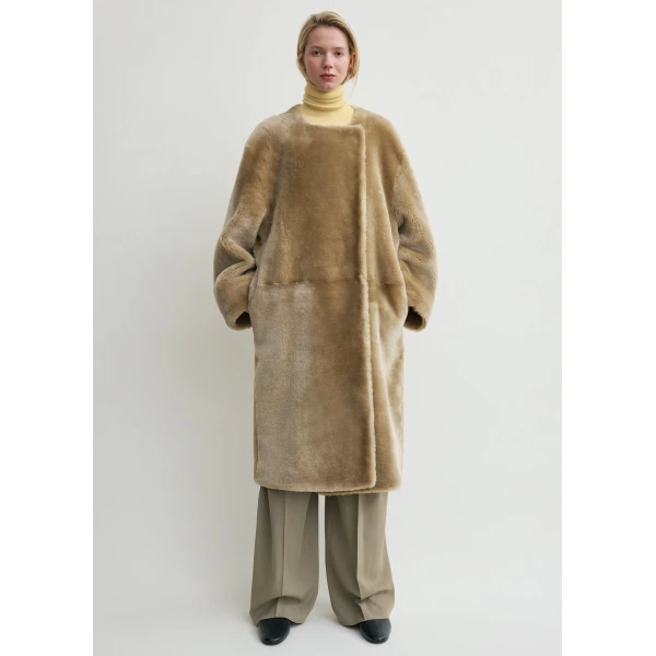 Totême Collarless shearling coat in Rye - Coats - Scandinavian Minimalist Luxury at Luxury Shoes 