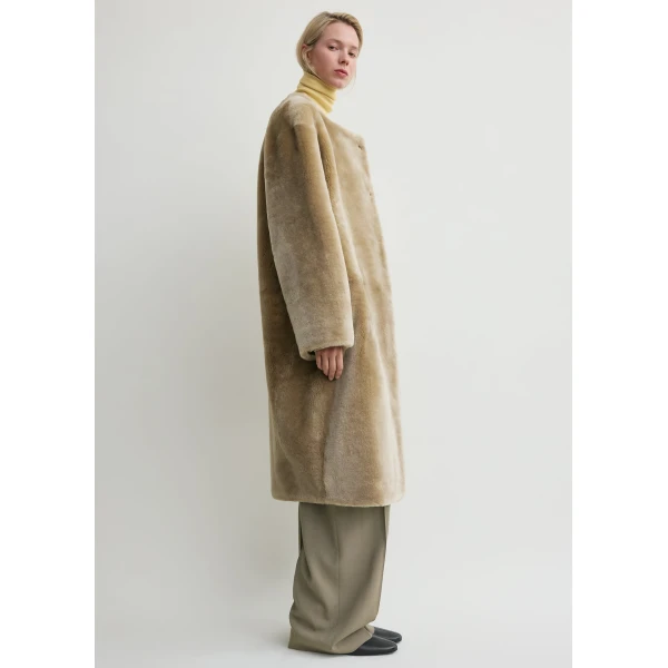 Totême Collarless shearling coat in Rye - Coats - Scandinavian Minimalist Luxury at Luxury Shoes 