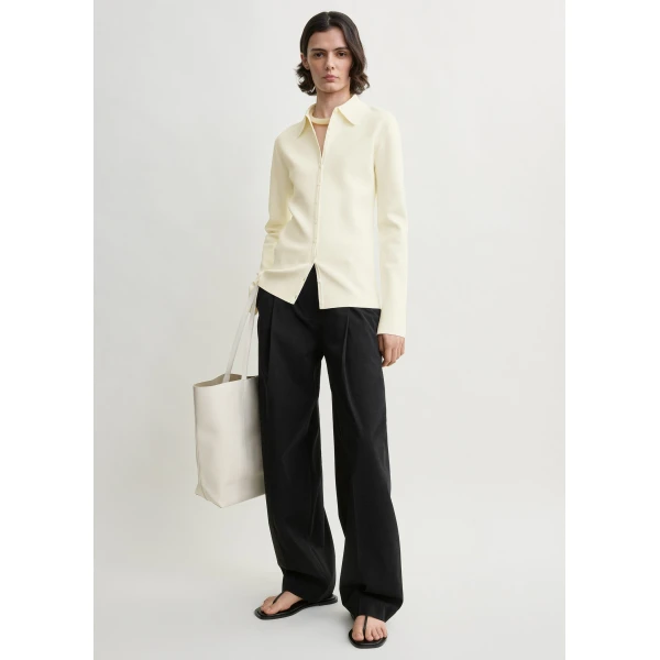 Totême Compact knit buttoned top in White - Knitwear - Scandinavian Minimalist Luxury at Luxury Shoes 