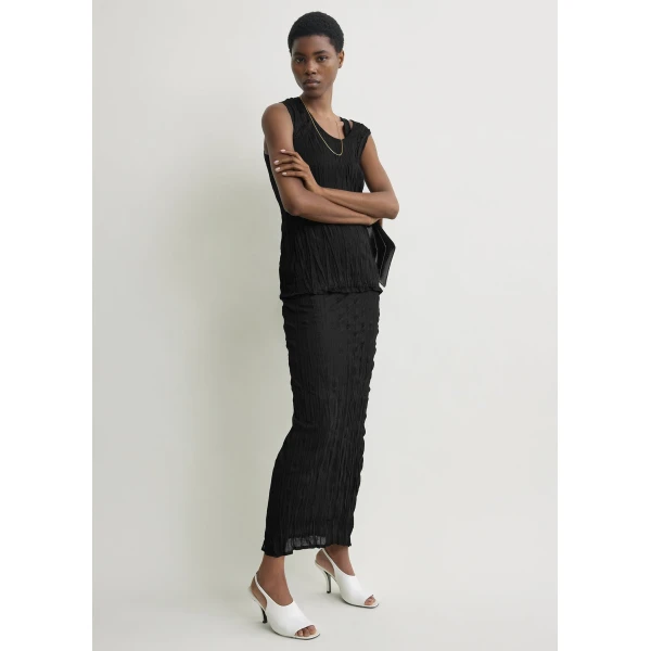 Totême Crinkled knit skirt in Black - Skirts - Scandinavian Minimalist Luxury at Luxury Shoes 