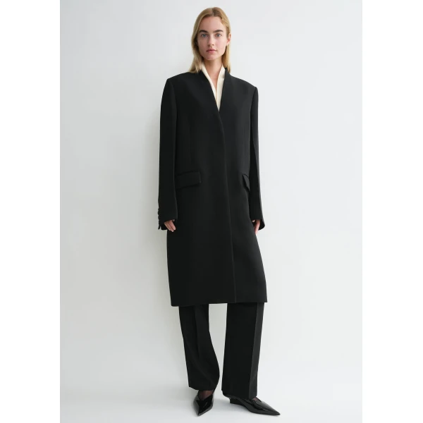 Totême Deep pleat coat in Black - Coats - Scandinavian Minimalist Luxury at Luxury Shoes 