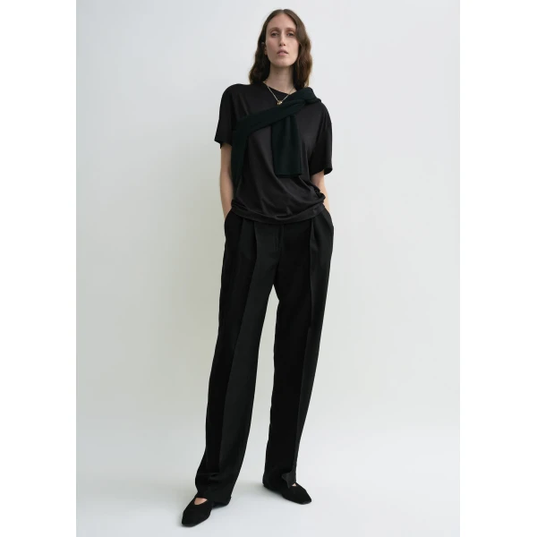 Totême Double-pleat fluid trousers in Black - Pants - Scandinavian Minimalist Luxury at Luxury Shoes 