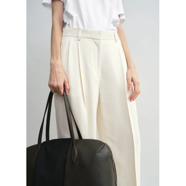 Totême Double-pleat fluid trousers in Ecru - Pants - Scandinavian Minimalist Luxury at Luxury Shoes 