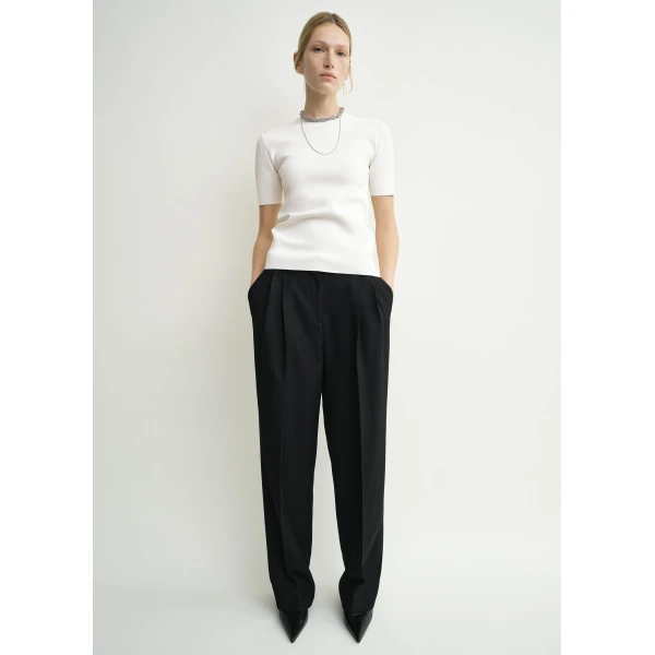 Totême Double-pleat tailored trousers in Black - Pants - Scandinavian Minimalist Luxury at Luxury Shoes 