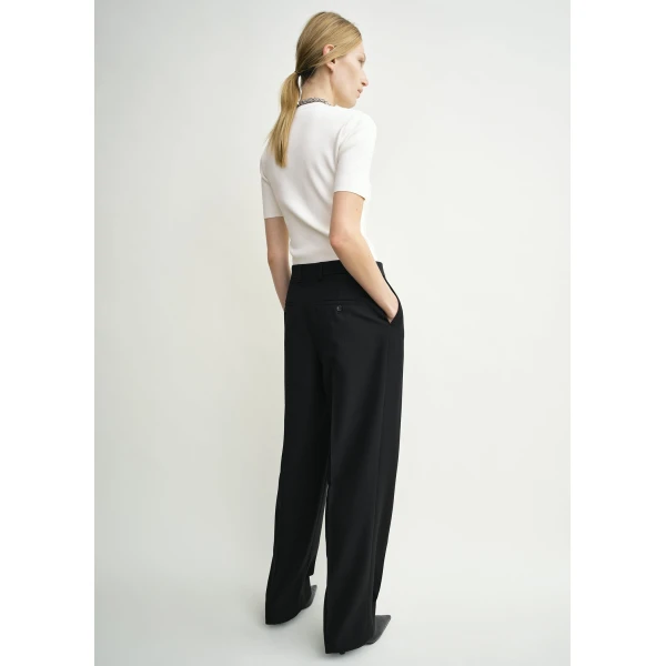 Totême Double-pleat tailored trousers in Black - Pants - Scandinavian Minimalist Luxury at Luxury Shoes 
