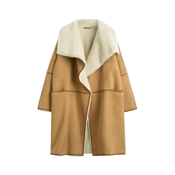 Totême Draped shearling coat in Tan - Coats - Scandinavian Minimalist Luxury at Luxury Shoes 