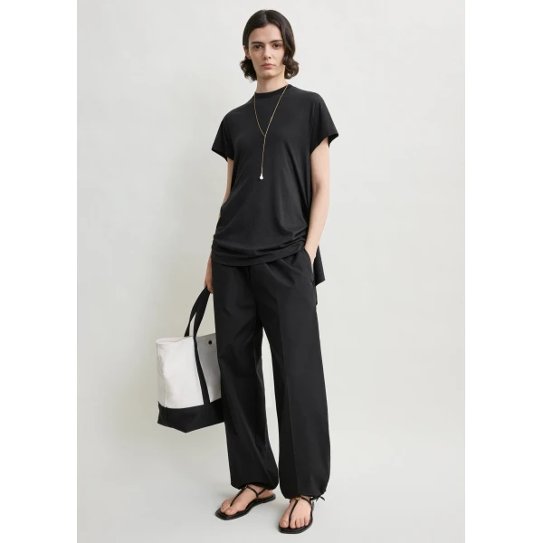 Totême Drawstring cotton trousers in Black - Pants - Scandinavian Minimalist Luxury at Luxury Shoes 