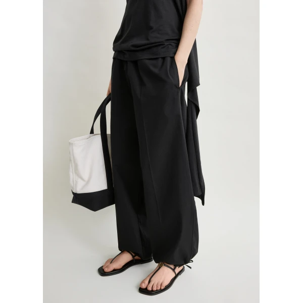 Totême Drawstring cotton trousers in Black - Pants - Scandinavian Minimalist Luxury at Luxury Shoes 