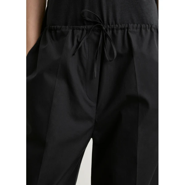 Totême Drawstring cotton trousers in Black - Pants - Scandinavian Minimalist Luxury at Luxury Shoes 