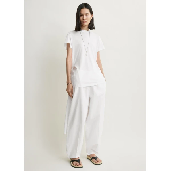 Totême Drawstring cotton trousers in White - Pants - Scandinavian Minimalist Luxury at Luxury Shoes 