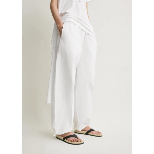 Totême Drawstring cotton trousers in White - Pants - Scandinavian Minimalist Luxury at Luxury Shoes 