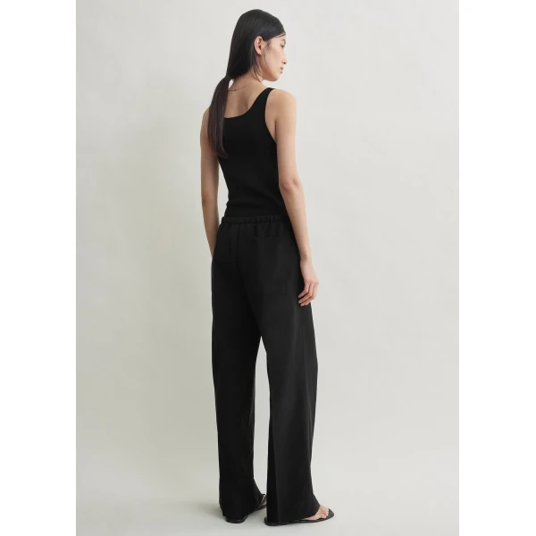 Totême Fluid drawstring trousers in Black - Pants - Scandinavian Minimalist Luxury at Luxury Shoes 