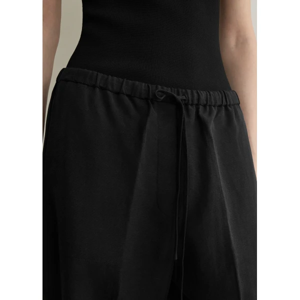 Totême Fluid drawstring trousers in Black - Pants - Scandinavian Minimalist Luxury at Luxury Shoes 
