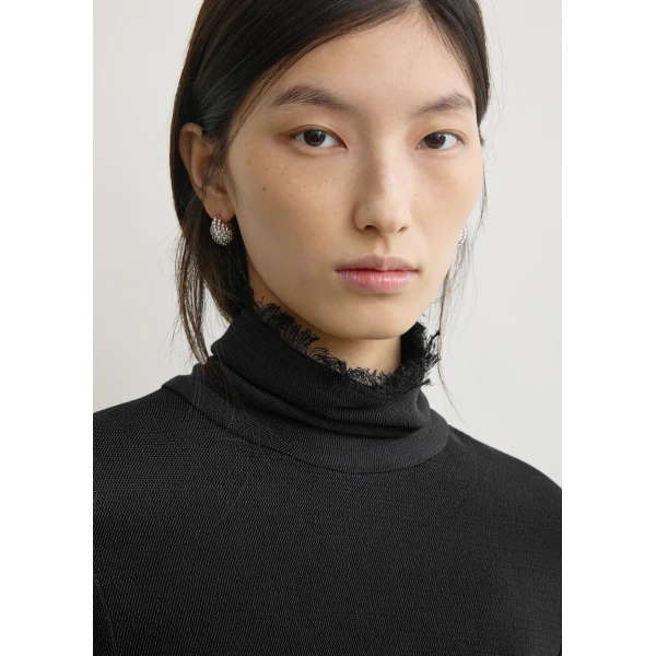 Totême Frayed-edge slim top in Black - Tops - Scandinavian Minimalist Luxury at Luxury Shoes 