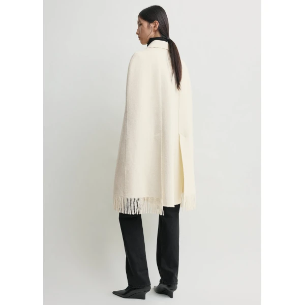 Totême Fringe cape coat in Winter white - Jackets - Scandinavian Minimalist Luxury at Luxury Shoes 